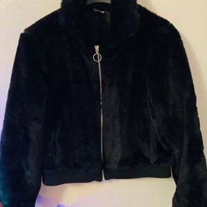 Woman’s faux fur jacket.
